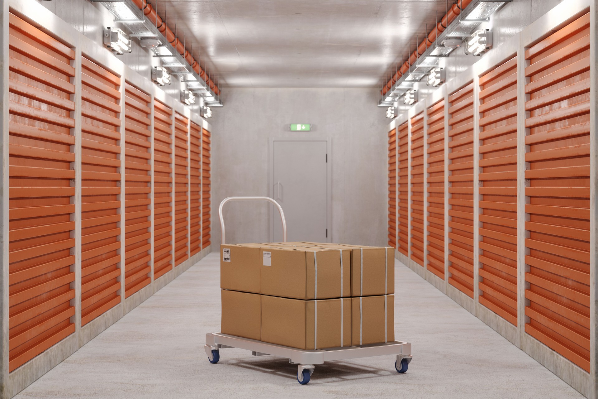 Self Storage Units And Close-up Of Hand Truck With Cardboard Boxes In Corridor